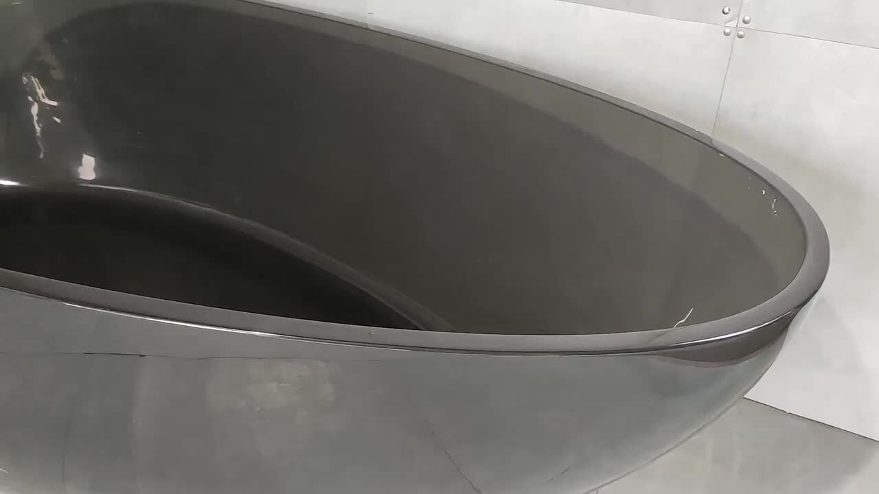Moray 67 in. x 34 in. Stone Resin Flatbottom Solid Surface Freestanding Soaking Bathtub in Black with Brass Drain