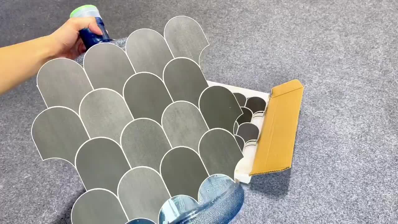 Smart Tiles Mosaik Muretto Brina 10.20'' x 9.10'' Peel & Stick Wall Tile in Charcoal. White & Stone Blue Smart Tiles Mosaik Muretto Brina 10.20'' x 9.10'' Peel & Stick Wall Tile in Charcoal. White & Stone Blue