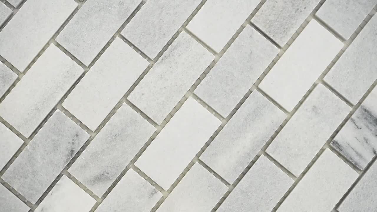 Carrara Classique Brick 11.81 in. x 11.81 in. Honed Marble Wall Tile (9.7 sq. ft./Case) Carrara Classique Brick 11.81 in. x 11.81 in. Honed Marble Wall Tile (9.7 sq. ft./Case)