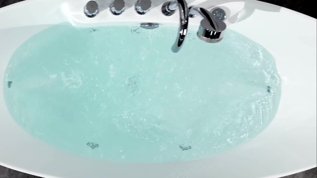 67 in. Center Drain Acrylic Freestanding Flatbottom Whirlpool Bathtub in White with Faucet - Water Jets