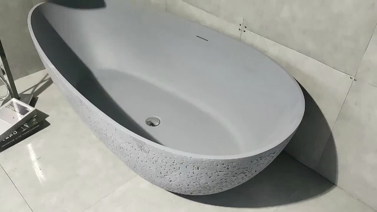 Moray 65 in. x 33 in. Stone Resin Flatbottom Solid Surface Freestanding Soaking Bathtub in Grey with Brass Drain
