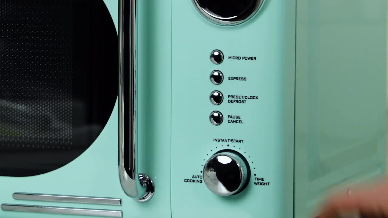 Nostalgia Retro 0.7 cu. ft. 700-Watt Countertop Microwave Oven in