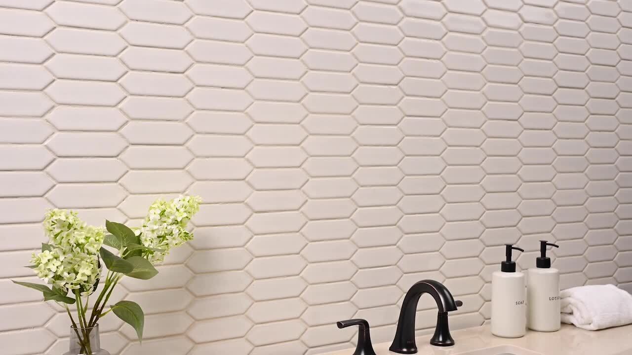 Whisper White Arabesque 10-1/2 in. x 15-1/2 in. x 8 mm Glossy Ceramic Mesh-Mounted Mosaic Wall Tile (11.7 sq. ft. /case) Whisper White Arabesque 10-1/2 in. x 15-1/2 in. x 8 mm Glossy Ceramic Mesh-Mounted Mosaic Wall Tile (11.7 sq. ft. /case)