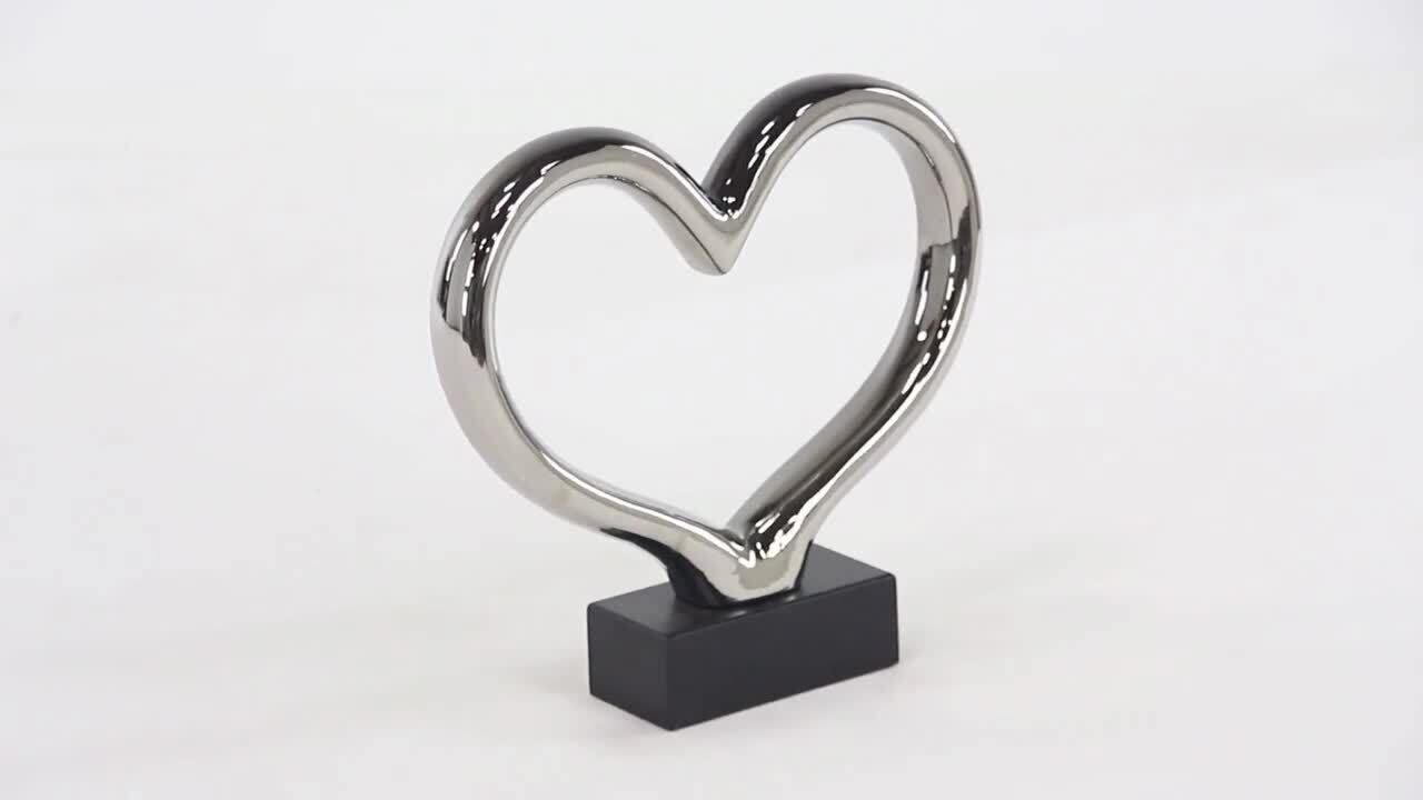 Silver Ceramic Heart Sculpture with Black Base