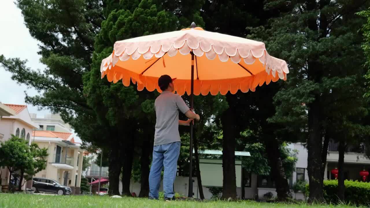 coral umbrella patio JONATHAN Y Tracy 9 ft. Scalloped Fringe Market Patio Umbrella with  Auto-Tilt, Crank, Wind Vent and UV Protection, Coral Pink/White UMB1002E