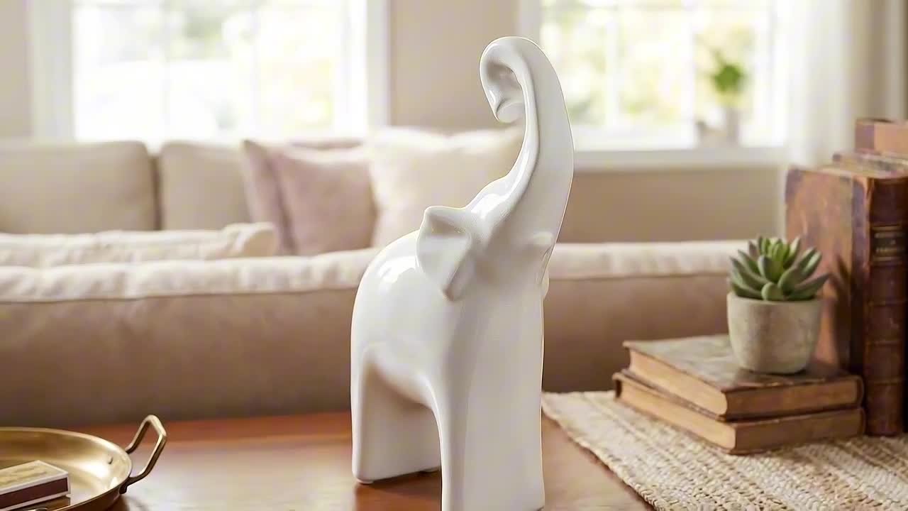 Liv & Skye White 6 in. x 11 in. Ceramic Modern Elephant Decorative