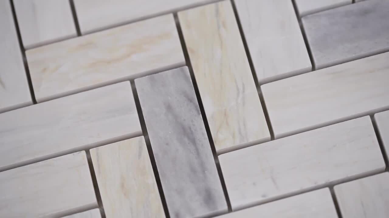 Shower Shelf Detail In Wall Of Herringbone Marble Tiles Stock