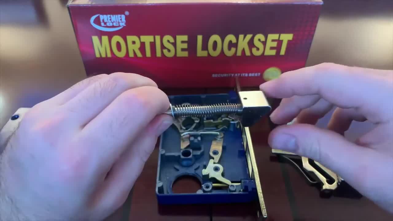 Mortise lock with antivibration latch for cylinder Brass