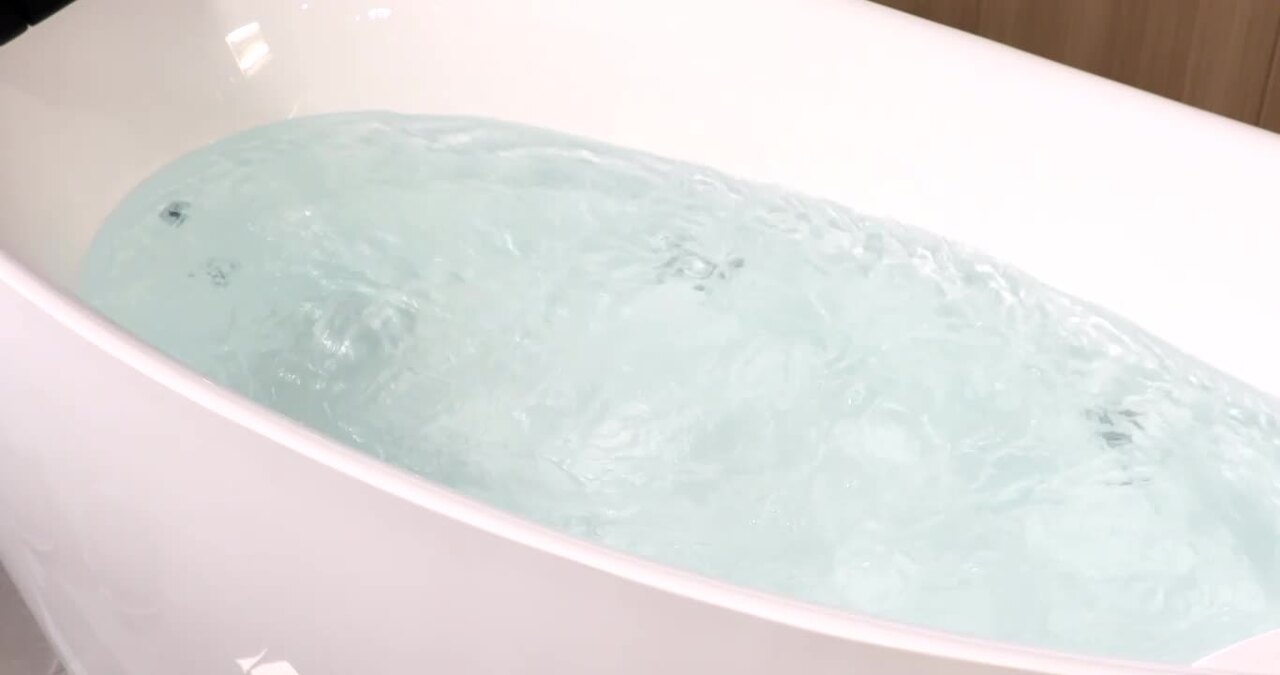 67 in. Right Hand Drain Acrylic Freestanding Flatbottom Whirlpool Bathtub in White with Faucet - Water Jets