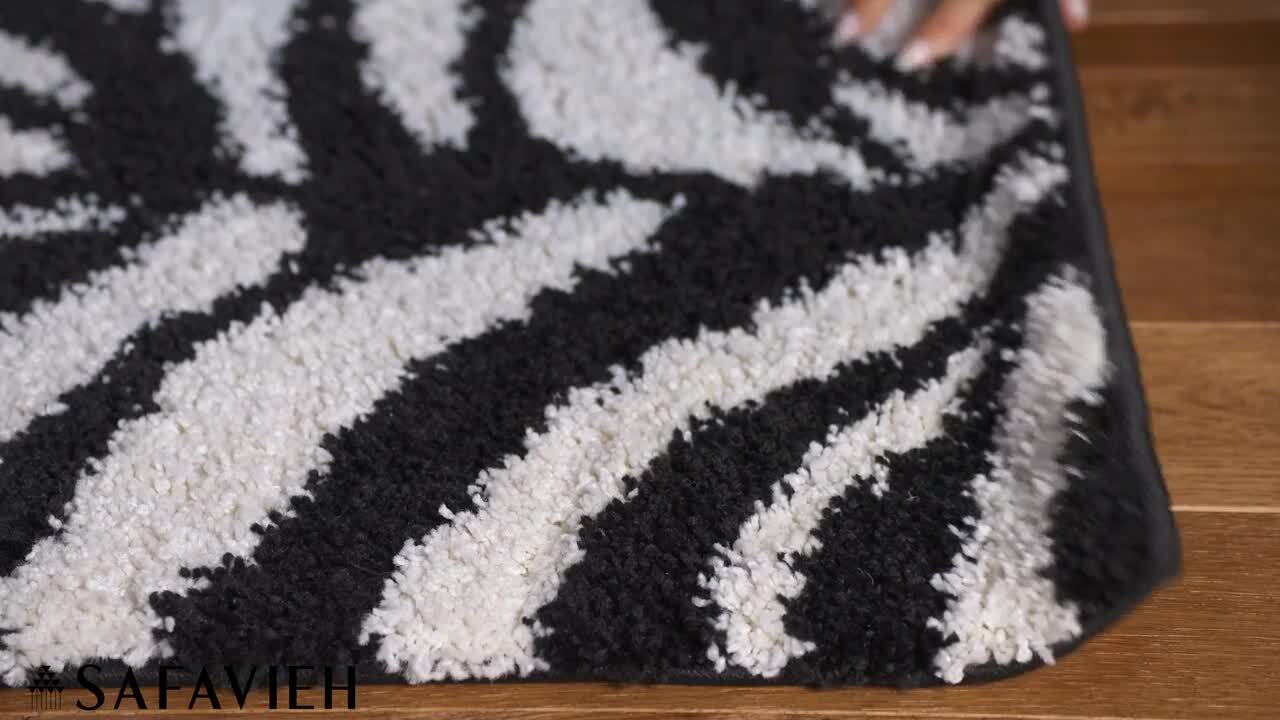 SAFAVIEH Florida Shag Ivory/Black 5 ft. x 8 ft. Animal Print Area