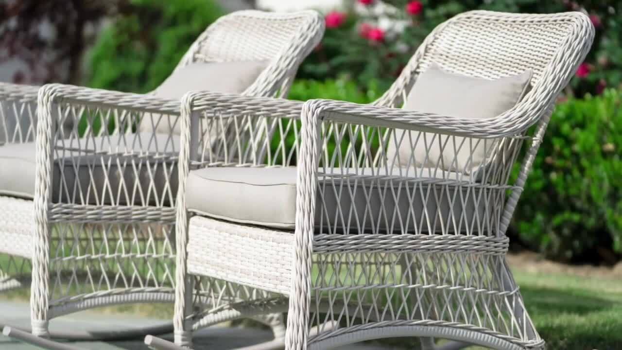 antique white wicker rocker