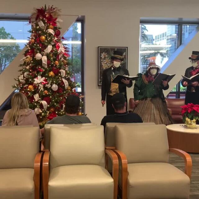 Photo of Keck Medicine of USC - Los Angeles, CA, US. 12/14/22 Carolers at the main hospital lobby for patients while waiting