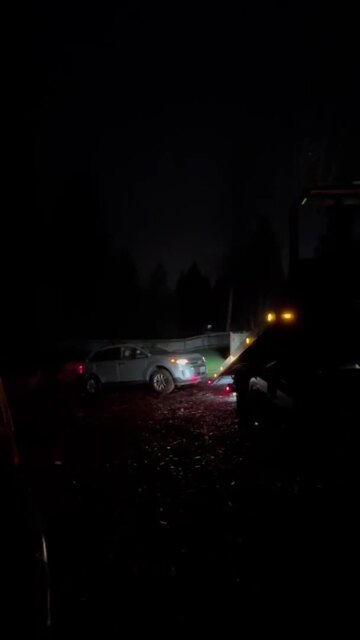 Photo of Tow World Towing - Renton, WA, US. Pull out of mud stuck vehicle in Renton,Wa by Tow World Towing Company flatbed tow truck