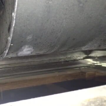 Photo of San Fernando Valley Heating and Air Conditioning - Los Angeles, CA, US. Water dripping from inside AC unit