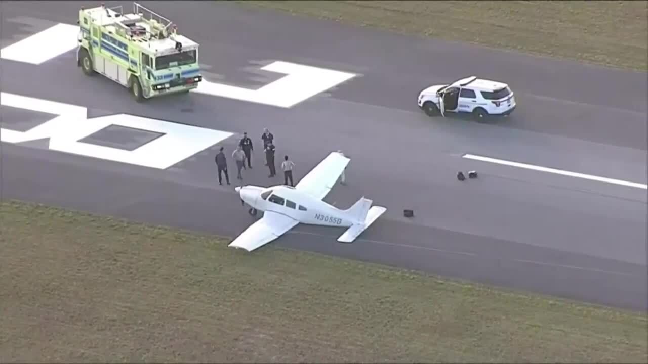 Small plane crashes into car during emergency landing in North