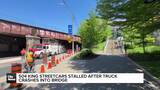 504 King streetcars stalled after truck crashes into bridge