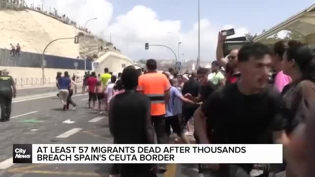 At least 57 migrants dead after thousands breach Spain's Ceuta border