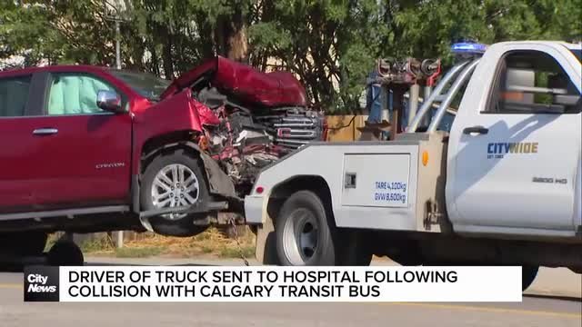 Driver of truck sent to hospital following collision with Calgary Transit bus