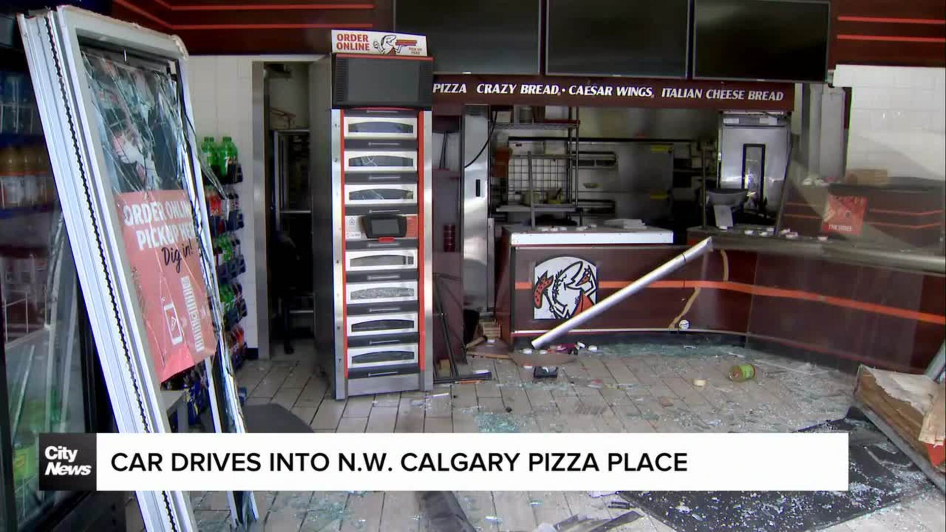 Car drives into N.W. Calgary pizza place