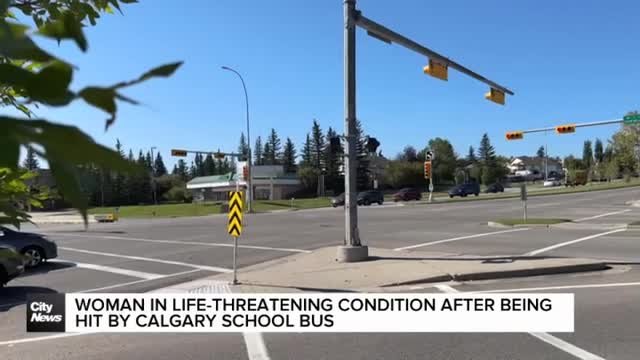 Woman in life-threatening condition after being hit by Calgary school bus