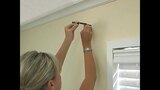 Learn how to correctly install a curtain rod and hang decorative drapery panels. In this video we're working with Blinds.com Grommet Drapery Panels. Curtains create the illusion of a larger window opening.