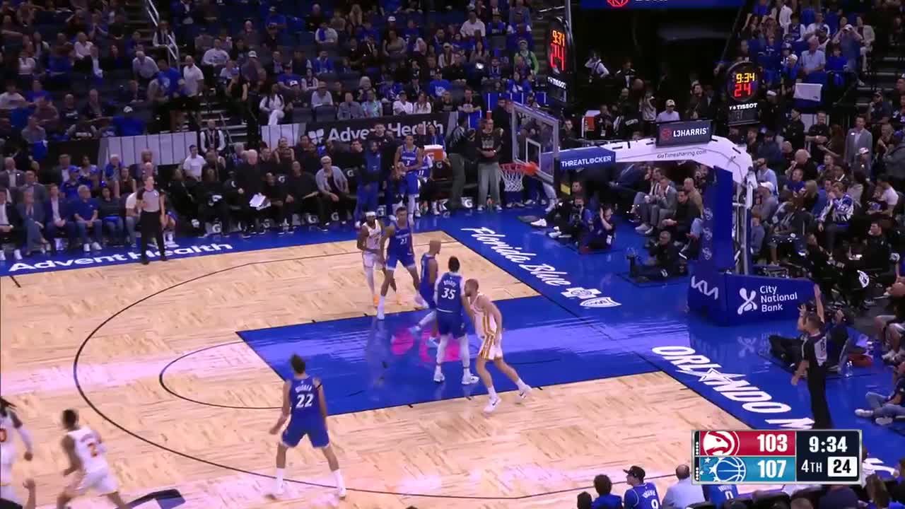 Aaron Wiggins hits from way downtown