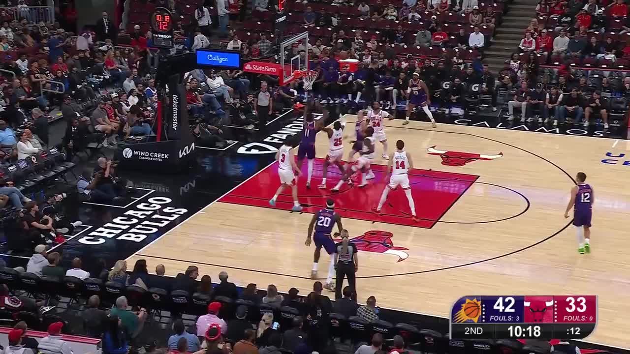 Oso Ighodaro throws it down! image