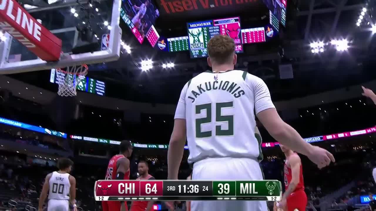 Kasparas Jakučionis scores and draws the foul