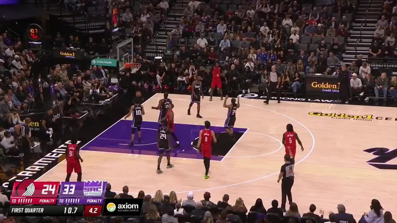 Damian Lillard scores and draws the foul