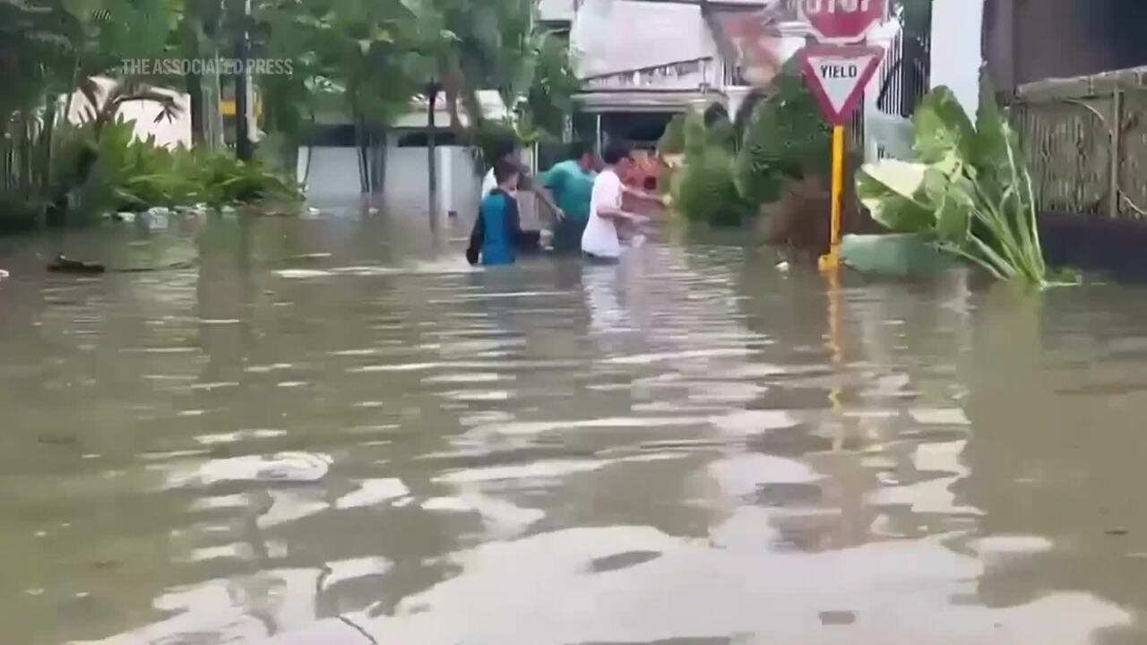 Typhoon Kalmaegi moves across central Philippines, leaving at least 1 dead  and setting off floods