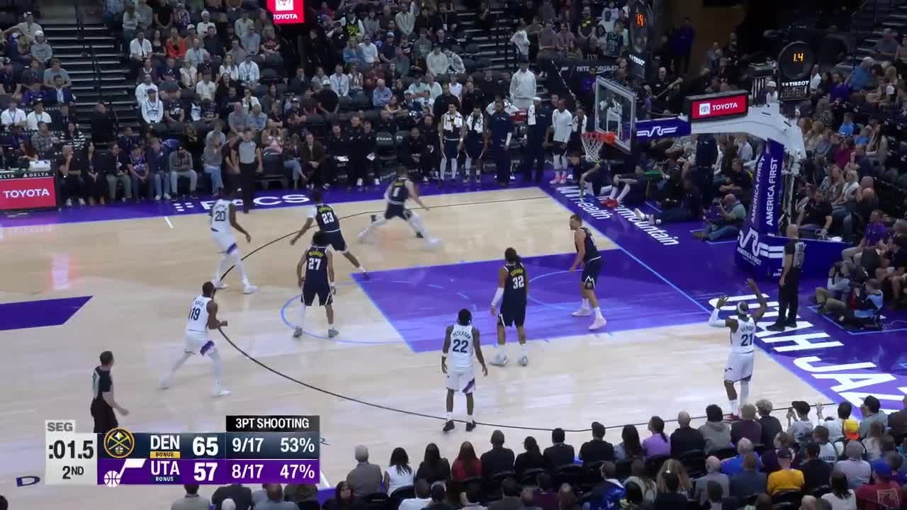 Isaiah Collier with the last basket of the period image