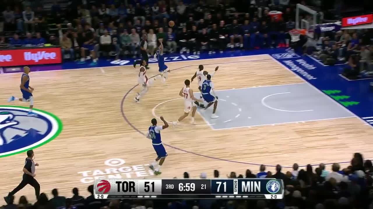 Jaden McDaniels slams home the alley-oop