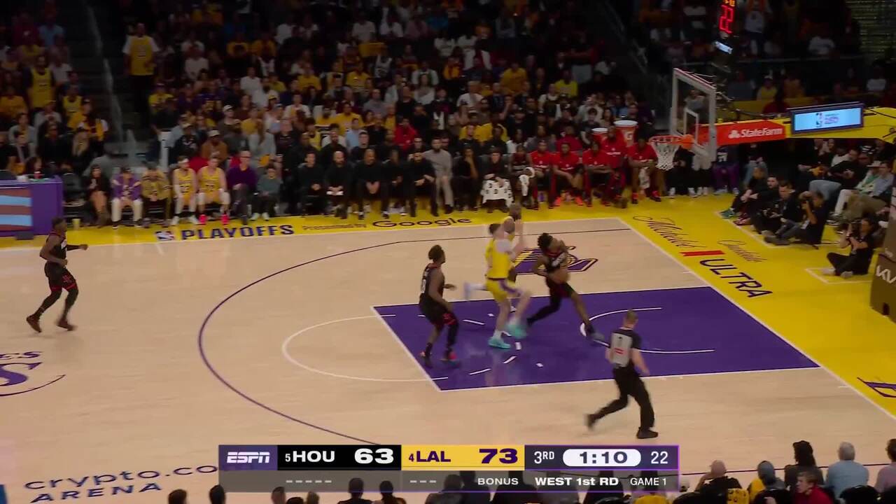 Jake LaRavia rises to block the shot