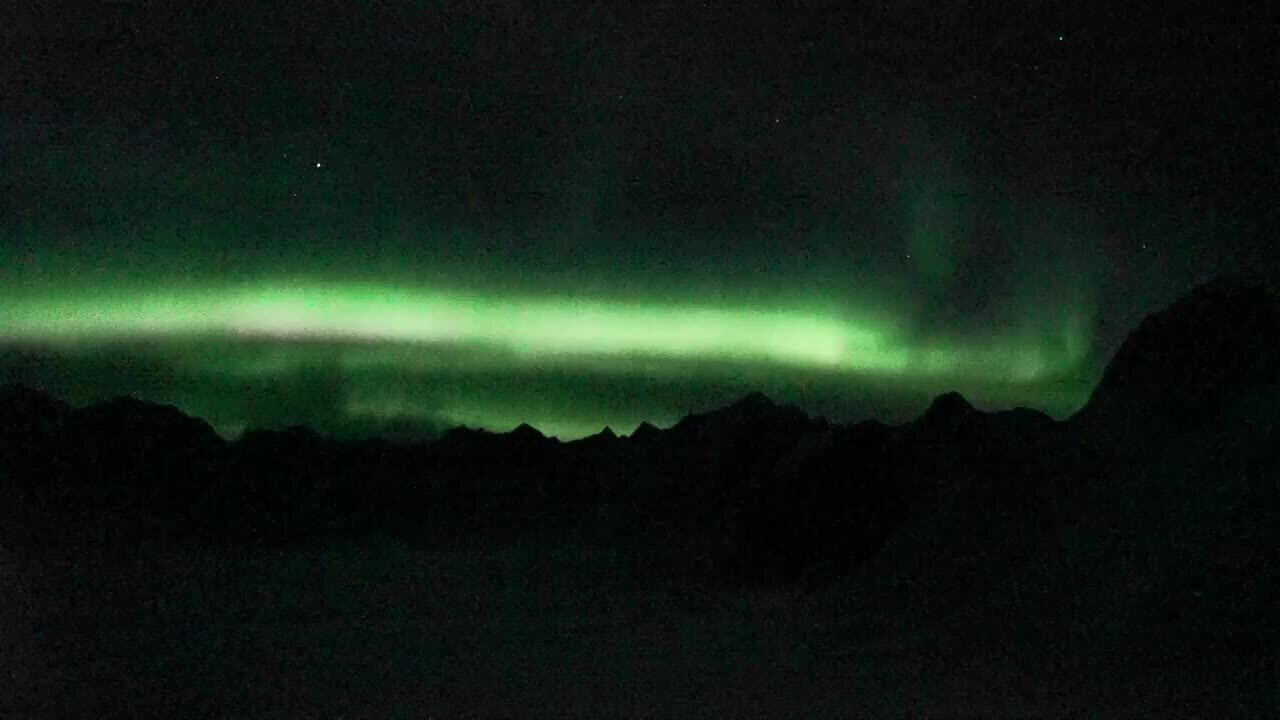 The Dancing Lights and Shrinking Ice of Denali