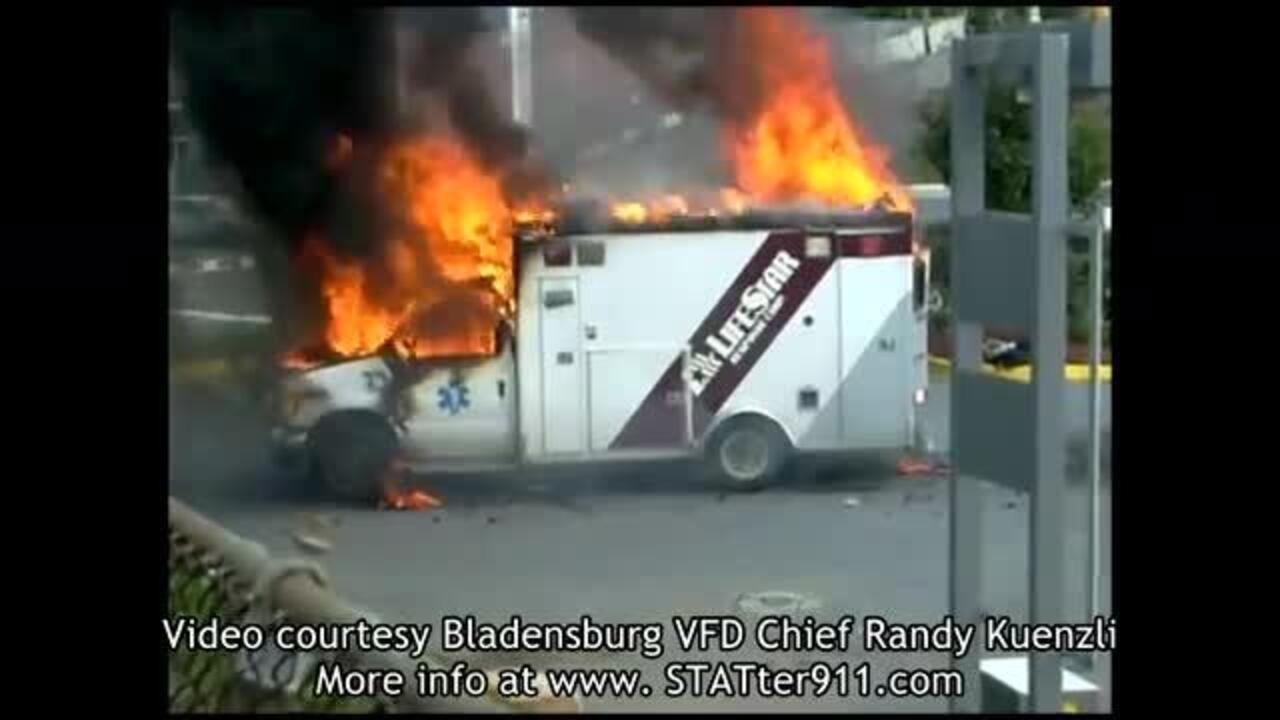 Explosion lifts roof off burning ambulance