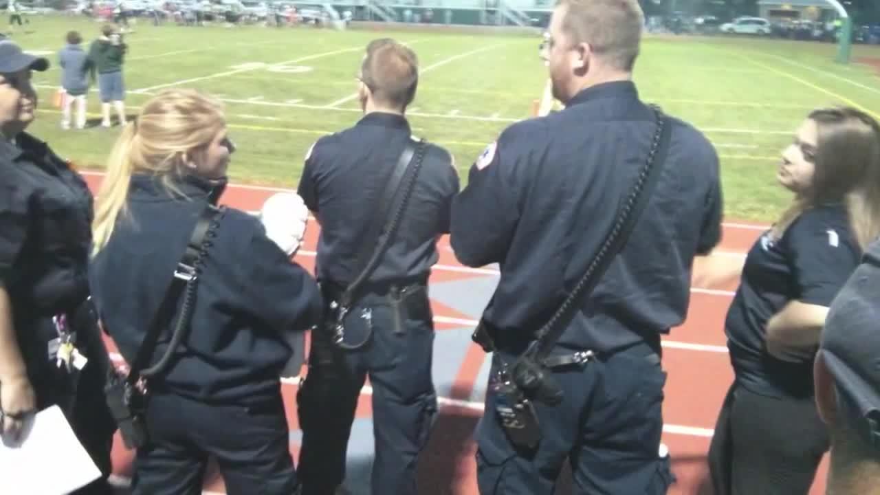 Video Mass CPR training at football game