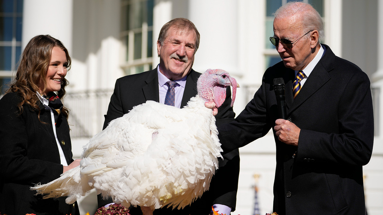 At turkey pardon, Biden serves jokes and vaccination push