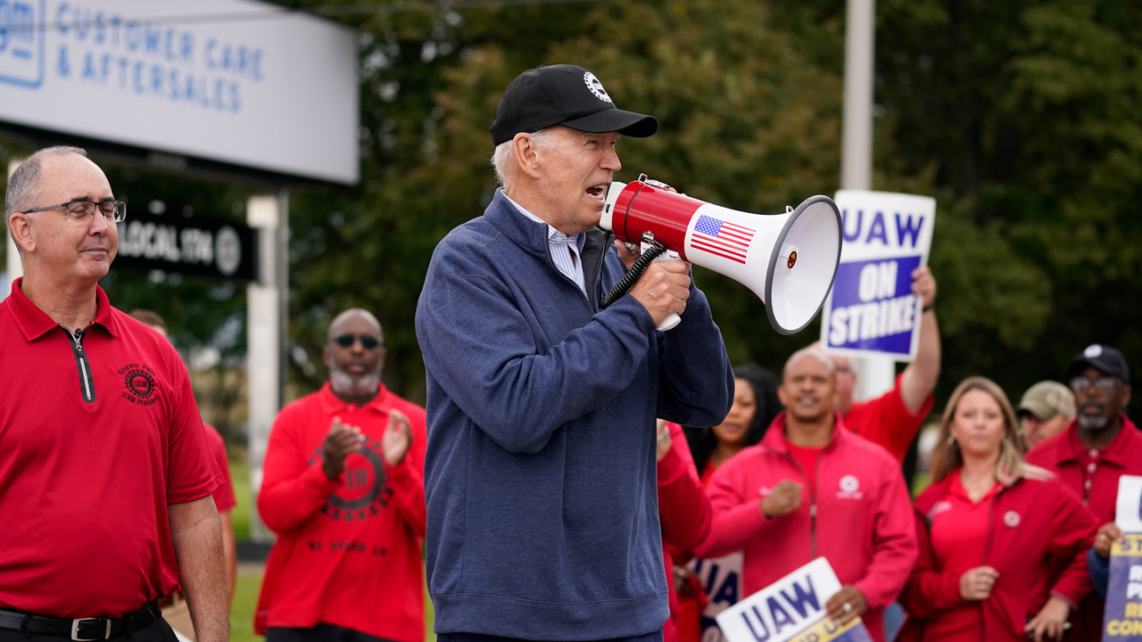 Biden joins striking auto workers on picket line