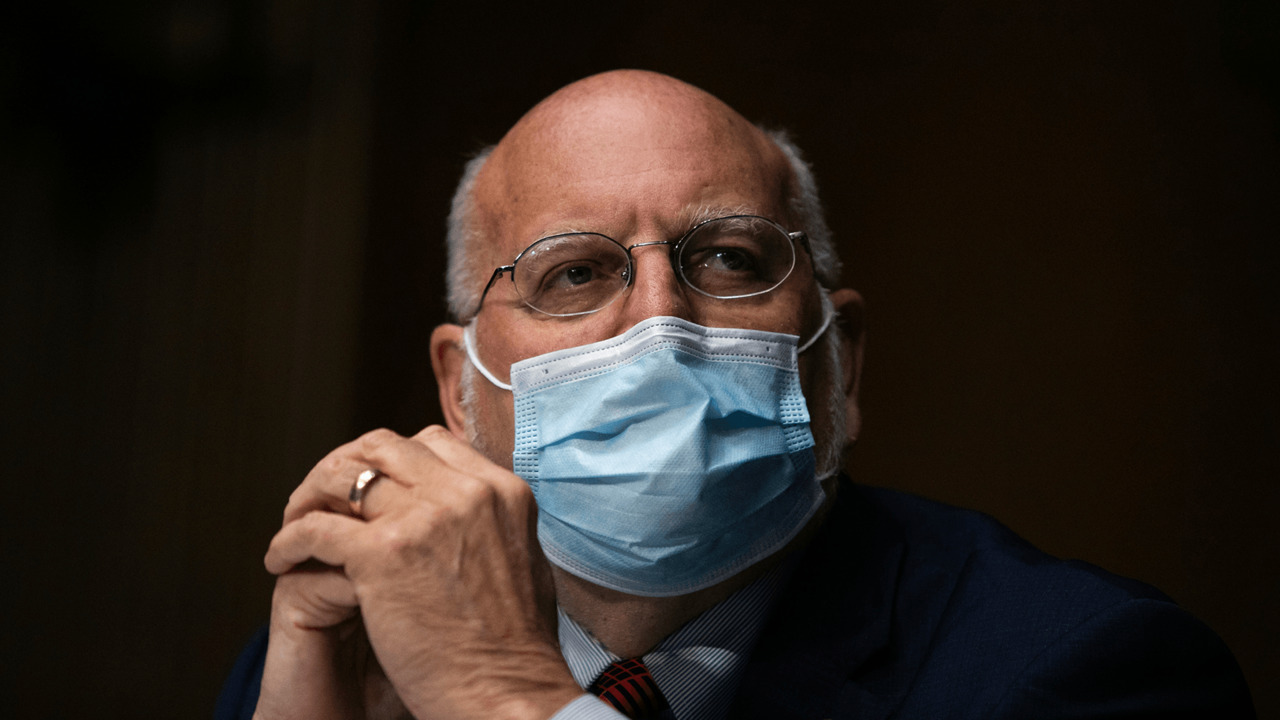 Redfield worried that two respiratory viruses could hit U.S. overstressing the health care