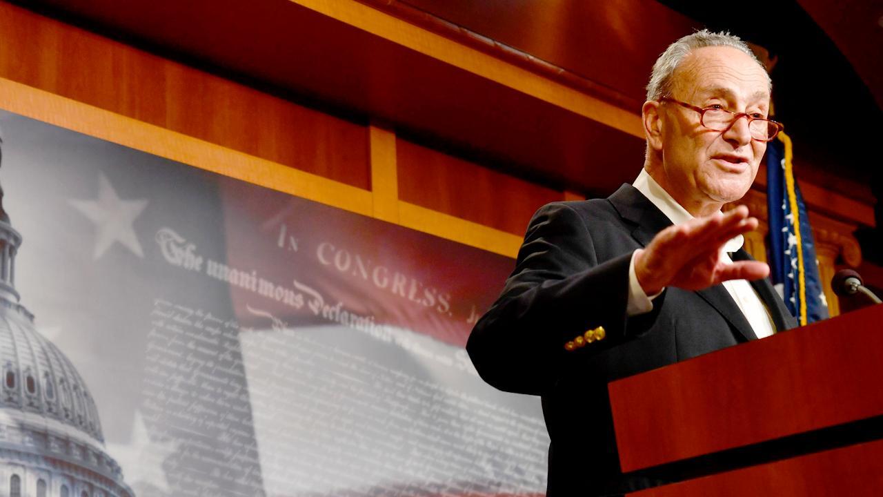 Chuck Schumer finds out about Sessions' firing during a press