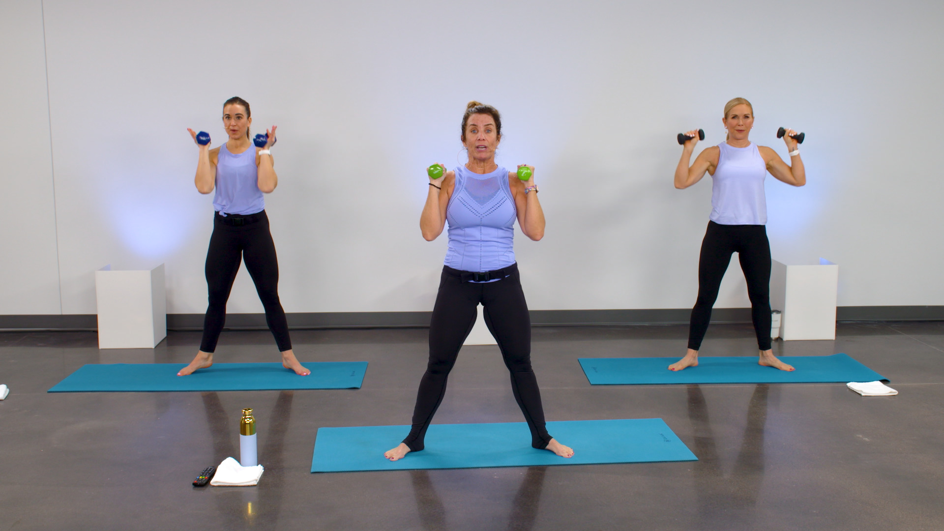 This Full-Body Barre Workout for Beginners Requires Just a Pair of Dumbbells