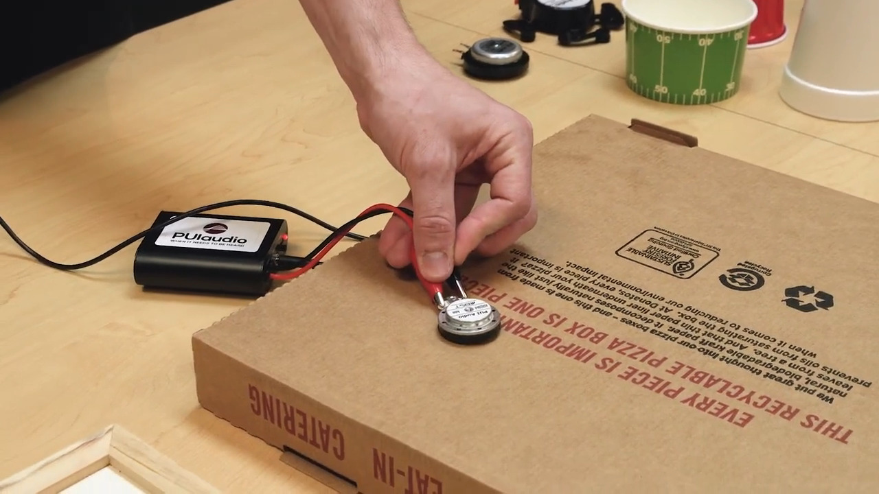 What can you do with haptics and exciter products? Turn a glass wall or pizza box into a speaker!
