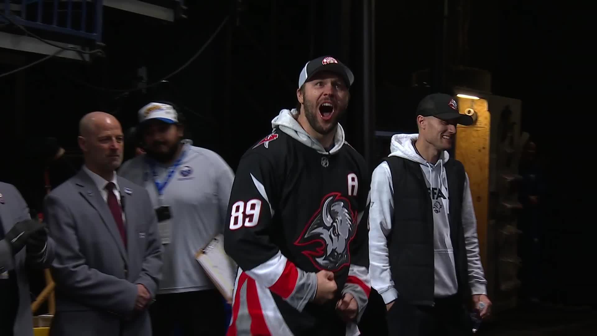 Bills’ Allen bangs drum and chugs beer to send Buffalo into a frenzy