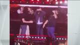 Gausman, Corbin, and Nylander join Luke Combs for a beer chug on stage