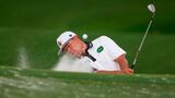 Im’s bunker shot bounces off stands, boomerangs back into trap