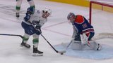 Sasson corrals loose puck and sets up Cotter for Canucks OT winner