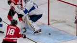 Canada’s Thomas bats puck out of midair to tie game vs. Finland