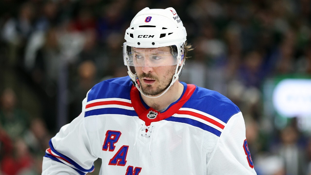 J.T. Miller wearing a New York Rangers jersey