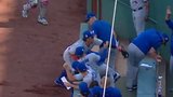 Okamoto reaches into Blue Jays dugout to make incredible catch
