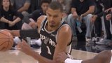 Wembanyama glides in for monster dunk after getting bumped by Wolves